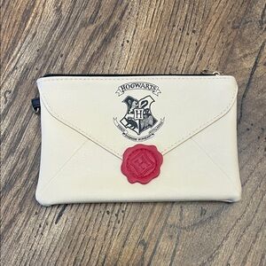 NWOT Hogwarts Cream Wristlet with Red Seal
